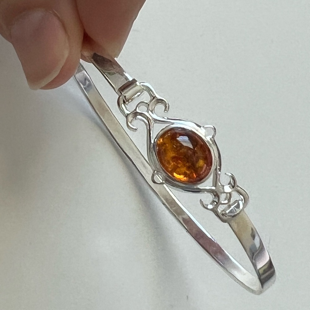 Sterling silver amber buckle bracelet.